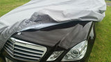 grey cover on black Mercedes 